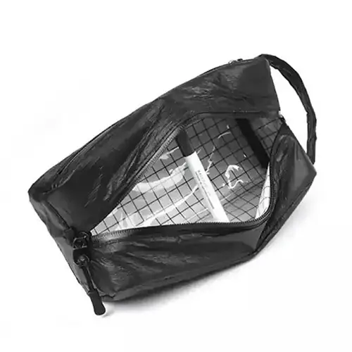 High-performance waterproof fabric and sealed zipper detail on travel dopp kit